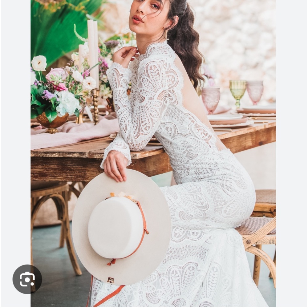 Brand new Watters wedding dress. Only tried on. New with tags.